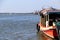 Boats moored in the vast river