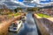 Boats moving through the lock gates on the Caledonian Canal Fort Augustus Scotland UK which connects Fort William to Inverness