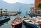 Boats near pier in town limone sul garda