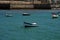 Boats off the coast of Cadiz near the fortress of Castillo Fortaleza de Santa Catalina.