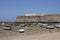 Boats off the coast of Cadiz near the fortress of Castillo Fortaleza de Santa Catalina.