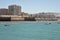 Boats off the coast of Cadiz near the fortress of Castillo Fortaleza de Santa Catalina.