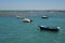 Boats off the coast near the beach of La Catalina in Cadiz.