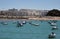 Boats off the coast near the beach of La Catalina in Cadiz.