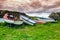 Boats parked at the sea\'s edge.