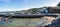 Boats parked at wooden jetties in Madla suburb on a coast of Hafrsfjord fjord