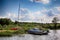 Boats parking - The old boat and sailing catamaran on the parking