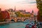 Boats passing under Pont Neuf in Paris, France