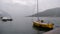 Boats pitch at anchor on the quay