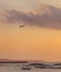 Boats and plane at evening