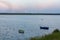 Boats on Pogoria 4 lake at moonrise