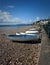 Boats pulled up onto the shore at Sidmouth in Devon.