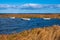 Boats and reeds on the island Moen on the Baltic Sea in Denmark