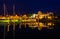 Boats reflecting at night at the Bay Bridge Marina in Kent Island