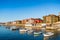 Boats in residential canal on a sunny day