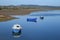 Boats on the river Axe estuary