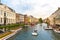 Boats on river canal in old tourist town, Europe