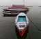 Boats at river Ganga Ghat people at holy ghats among ancient hindu temples in early morning in Varanasi Evening at Banaras Ghat