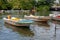 Boats for river safari on the pier. tropical Madu river. mooring operation