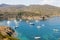Boats and sailboats moored in a small bay in the Cap de Creus Natural Park. Costa Brava, Catalonia, Spain