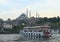 Boats sailing Golden Horn Bay during sunset