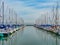 Boats at San Francisco South Beach Yacht Club with their reflect