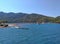 Boats, sea, sky and tourists in water at Girl Sand Beach. Here is famous shoal, a place of pilgrimage of tourists