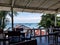 Boats ships waiting laying sea infront beach harbour port view balcony terrace seats sitting islands thailand asia samui