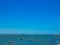 Boats on a small part of the Mediterranean sea protected from the waves by a tongue of land towards Port-Saint- Louis-du-RhÃ´ne in