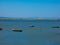 Boats on a small part of the Mediterranean sea protected from the waves by a tongue of land towards Port-Saint- Louis-du-RhÃ´ne in