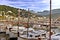 Boats in Soller port with beautiful blue sky and misty hills, mallorca, spain