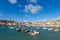 Boats in St Ives harbour Cornwall England on a calm summer day