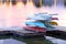 Boats stacket on dock at sunset