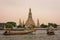 Boats and tourists around Wat Arun in Bangkok