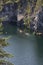 Boats with tourists float on the lake of the Great Marble Canyon in the Republic of Karelia in Russia