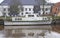 Boats, tugs and motor boats at the port harbor pier