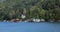 Boats and various constructions on the shore of the lake on August 09, 2018 in Bicaz