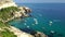 Boats and yachts on azure sea. Aerial view of the mountains and rocky seascape. Untouched nature, clean water. Rocky