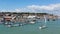 Boats and yachts Cowes harbour Isle of Wight with blue sky