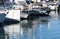 Boats and yachts dock at the seaport on the Mediterranean coast