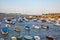 Boats and yachts docked at the Cobb harbor of Lyme Regis. West Dorset. England