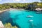 Boats and yachts on Macarella beach, Menorca, Spain