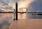 Boats and yachts moored at sunset