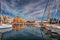 Boats and yachts parked in La Cala bay, old port in Palermo