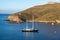 Boats, yachts sailing or moored on blue calm sea around Kea, Tzia island in Greece