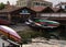 A boatyard with gondolas and other boats ready for repair in Venice, Italy