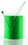 Bobbin of green sewing thread with pin