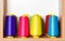 Bobbins of multicolored silk threads for embroidery and professional embroidery machines