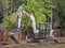 Bobcat compact excavator working in residential area
