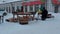 BOBRUISK, BELARUS 05.01.21: Female seller sits waiting for customers at farmer\'s market near store shop, woman sells